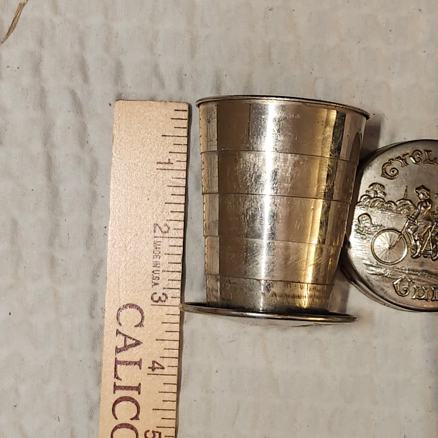 Vintage Collapsing Bicyclist Cup